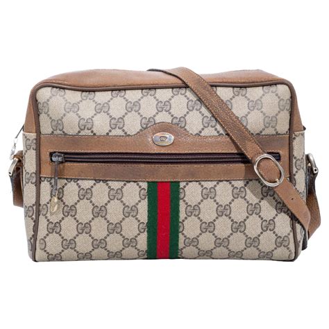 gucci gg supreme leather cross-body bag|gucci ophidia crossbody bag vintage.